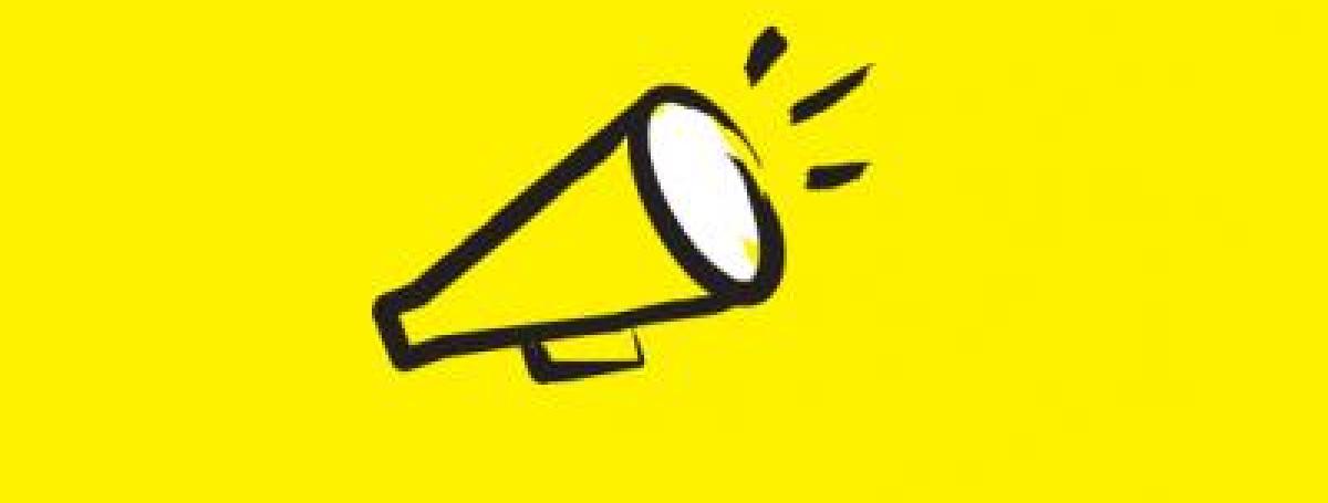 An illustration of a megaphone outlined in a black paintbrush style design with yellow accents.