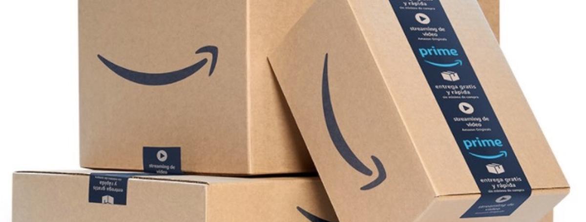 Three stacked cardboard shipping boxes from Amazon Prime home delivery.