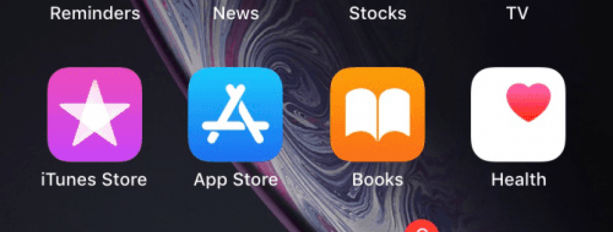 Menu d'applications sur iPhone, sur lequel on voit l'application Calendrier sélectionnée.