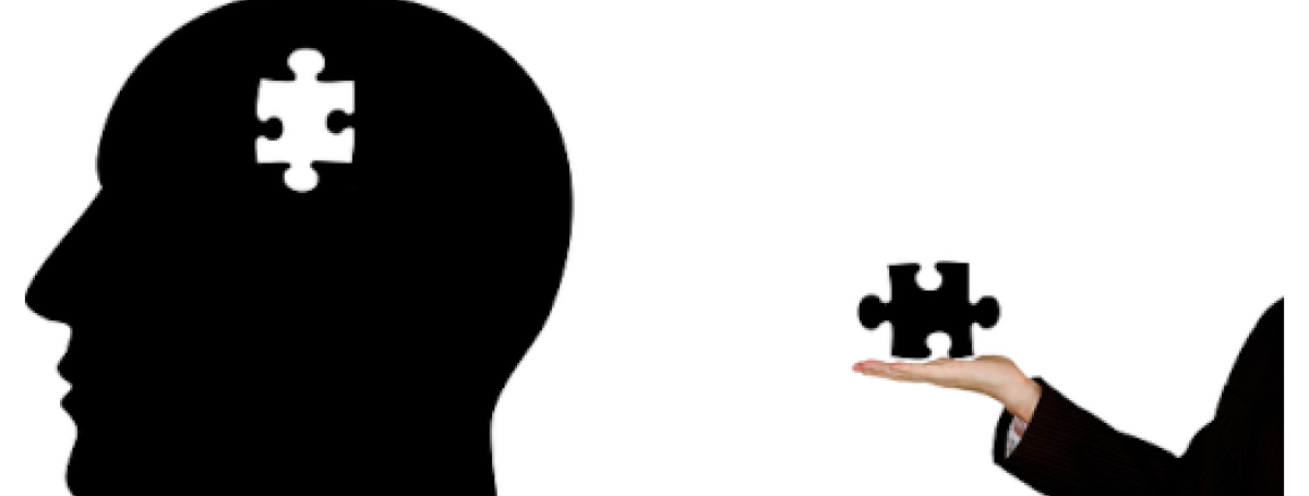 Illustration/silhouette d’une tête chauve. Il manque une pièce de puzzle à l’intérieur de la tête. À droite de la tête, une main étrangère sort du cadre et tient la pièce manquante du puzzle.