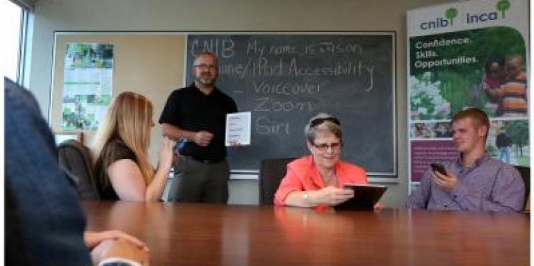 A group of people participating in tech training