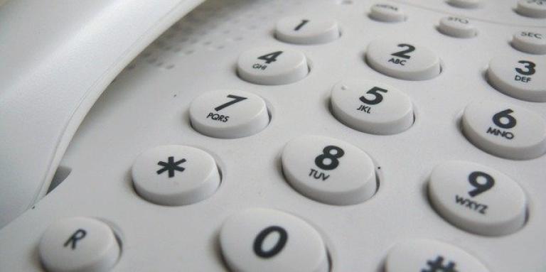 The keypad of a landline telephone.