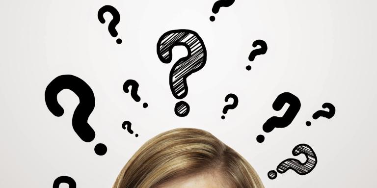 Photo of the top part of a woman's face with an illustration of question marks floating above her head.