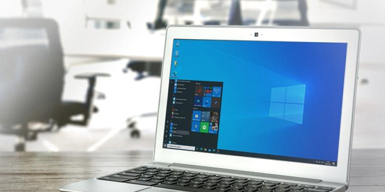 A laptop computer displays the Windows operating system.