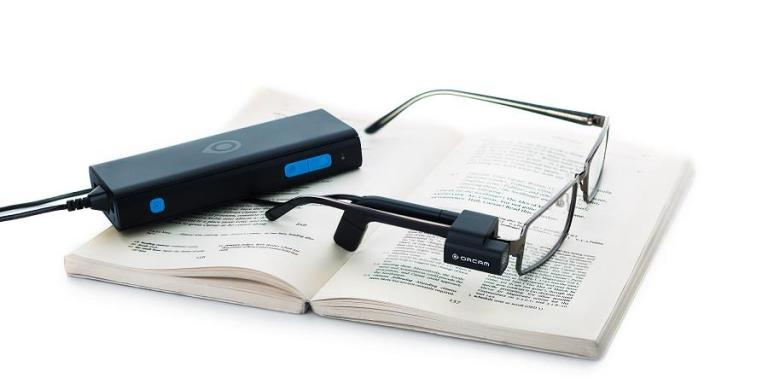 Orcam mounted on top of a pair of glasses
