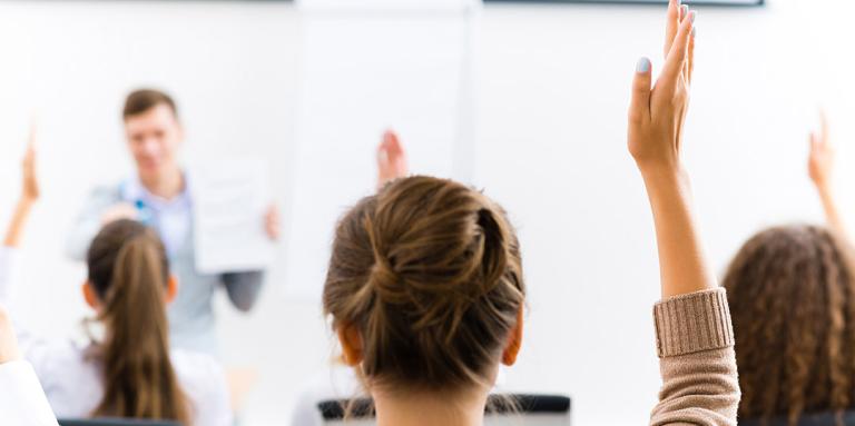 Girl raising her hand