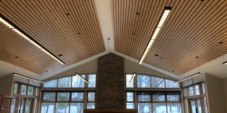 The lounge – our social gathering hotspot – with new sound panels installed on the ceiling.