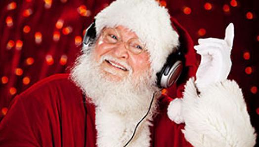 Santa Claus wearing headphones